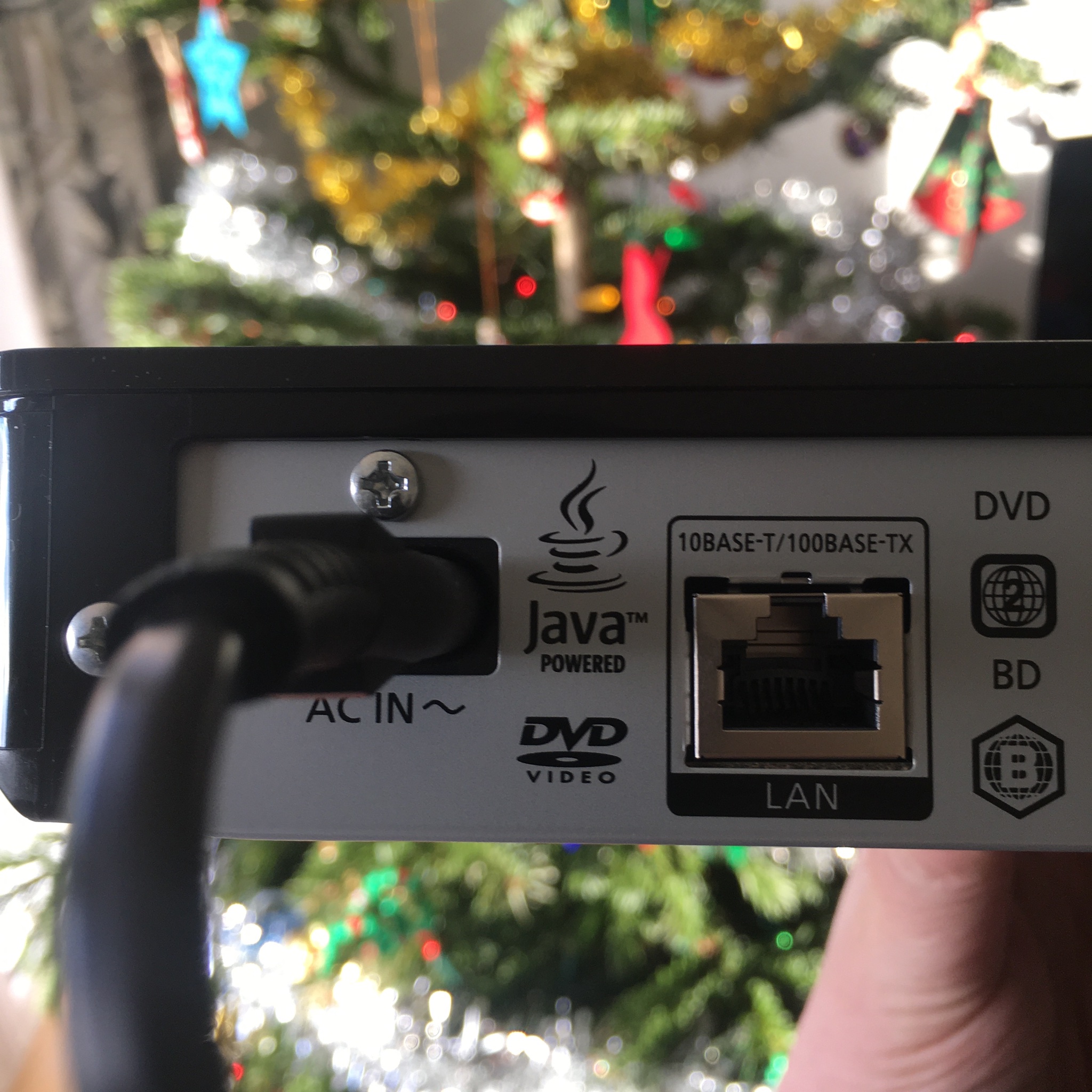 A photo of the back of a Blu-ray player, featuring the "Java Powered" logo
